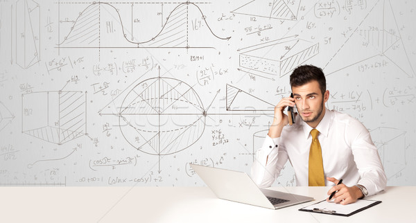 Businessman with business calculations background Stock photo © ra2studio