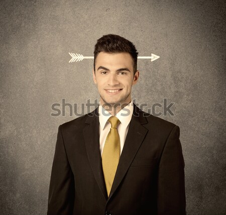 Young sales guy with arrow in the head Stock photo © ra2studio