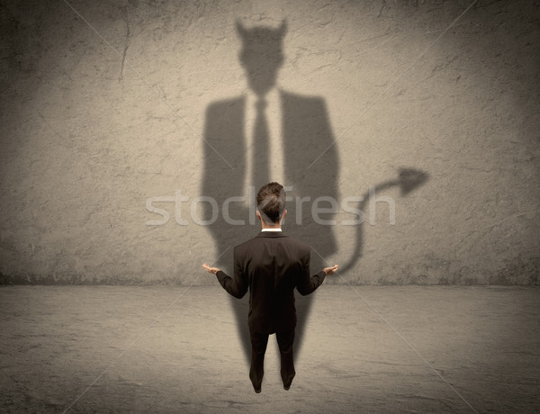 Vendedor próprio diabo sombra experiente Foto stock © ra2studio