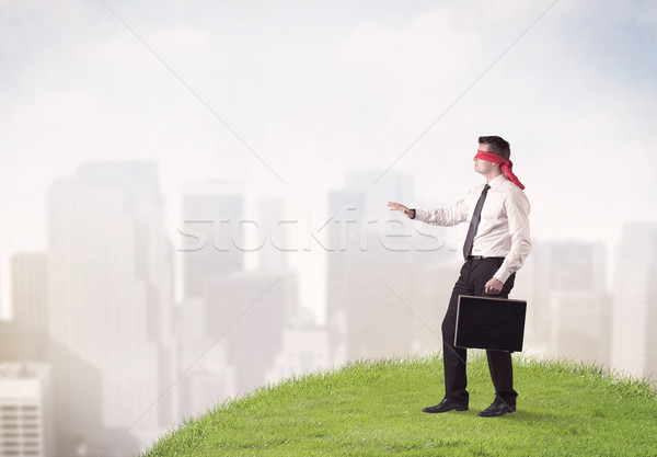Blindfolded businessman c Stock photo © ra2studio