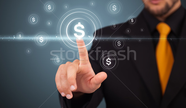 Businessman pressing modern business type of buttons Stock photo © ra2studio