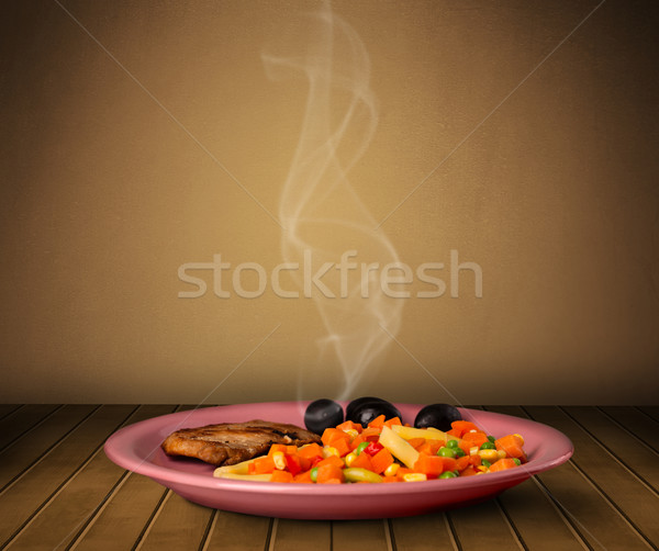 Fresh delicious home cooked food with steam Stock photo © ra2studio