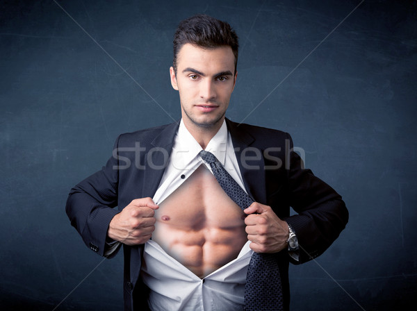 Businessman tearing off shirt and showing mucular body Stock photo © ra2studio