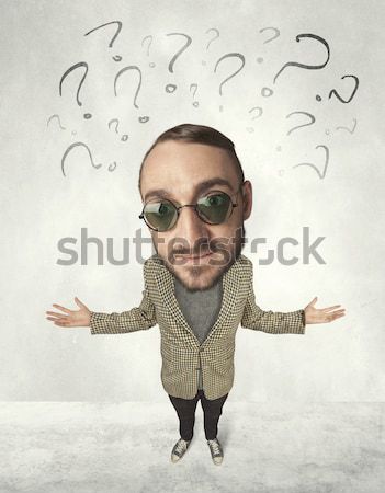 Big head person with question marks Stock photo © ra2studio