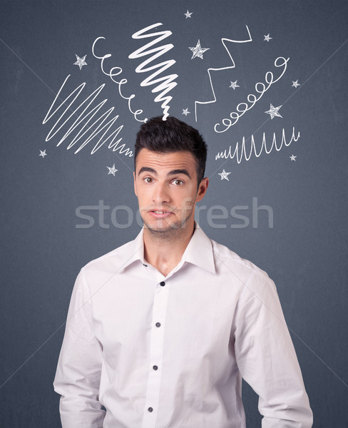 Businessman with scribbles Stock photo © ra2studio