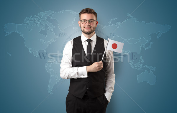 Man standing with flag and map background Stock photo © ra2studio