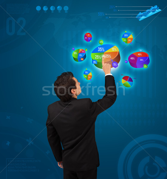 Stock fotó: üzletember · kisajtolás · kördiagram · gomb · futurisztikus · technológia