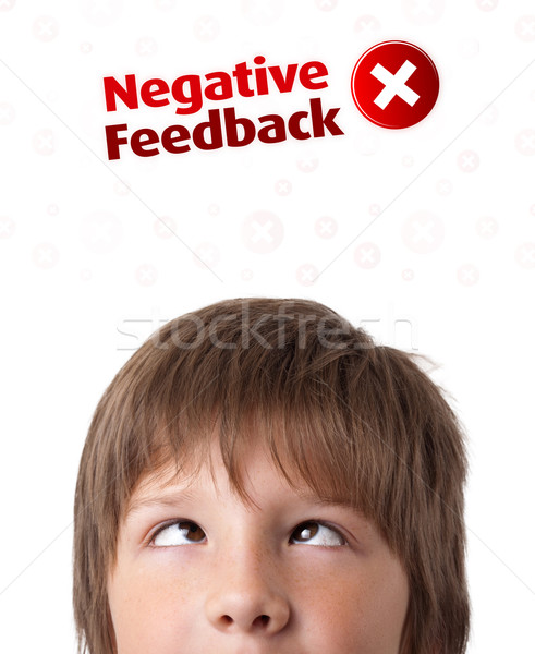 Young head looking at positive negative signs Stock photo © ra2studio