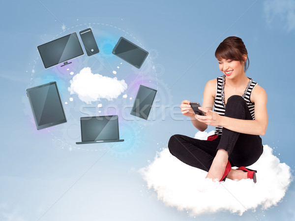 Young girl sitting on cloud enjoying cloud network service Stock photo © ra2studio