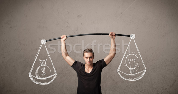 muscular man trying to get balanced  Stock photo © ra2studio