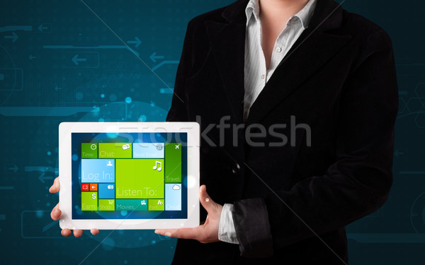 Lady holding tablet with modern software operational system Stock photo © ra2studio