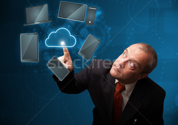 Imprenditore toccare alta tecnologia nube servizio piedi Foto d'archivio © ra2studio