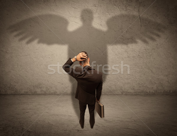 Vanzator înger umbră de succes om de afaceri Imagine de stoc © ra2studio