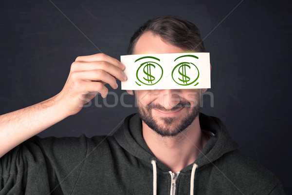 Guy halten Papier Hand gezeichnet Dollarzeichen grünen Stock foto © ra2studio