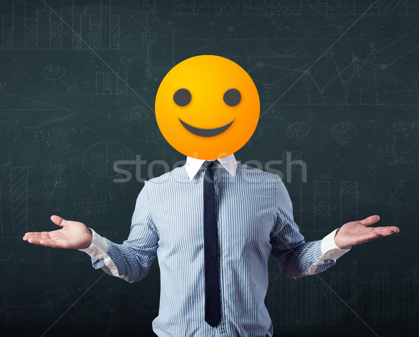 businessman wears yellow smiley face Stock photo © ra2studio