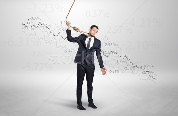 Desperate businessman with decreasing loss concept Stock photo © ra2studio