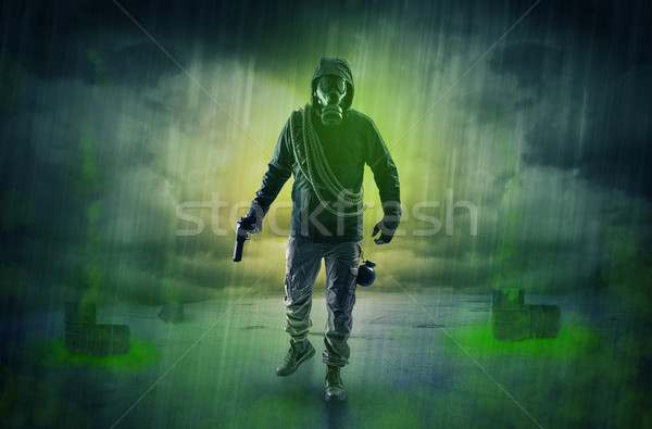 Stock photo: Guard in an abandoned space after explosion