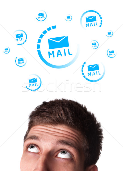 Young head looking at support contact type of icons and signs Stock photo © ra2studio