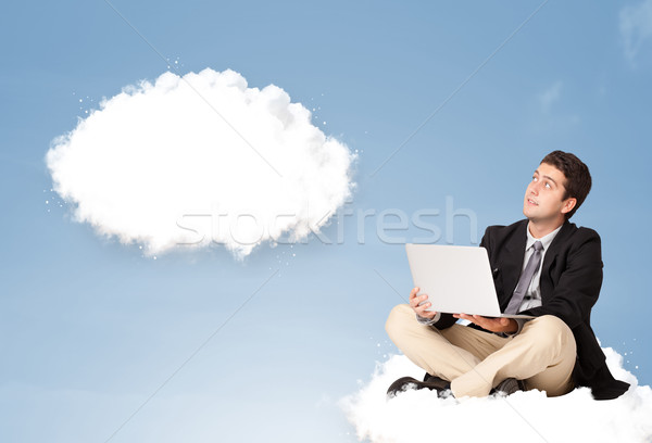 Handsome young man sitting on cloud and thinking of abstract speech bubble Stock photo © ra2studio