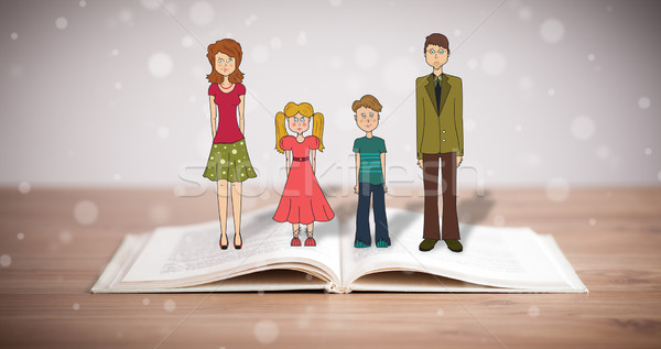 Drawing of a happy family on opened book Stock photo © ra2studio