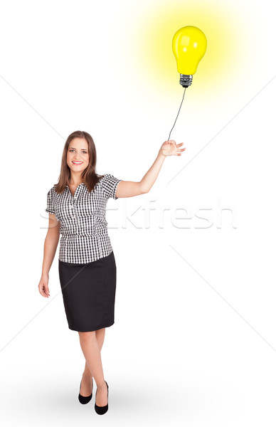 Heureux femme ampoule ballon jeune femme [[stock_photo]] © ra2studio