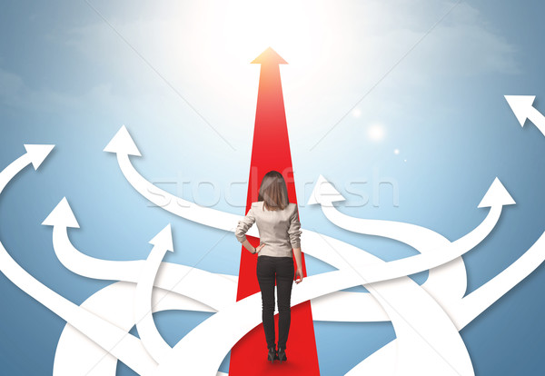 businesswoman with different direction arrows Stock photo © ra2studio