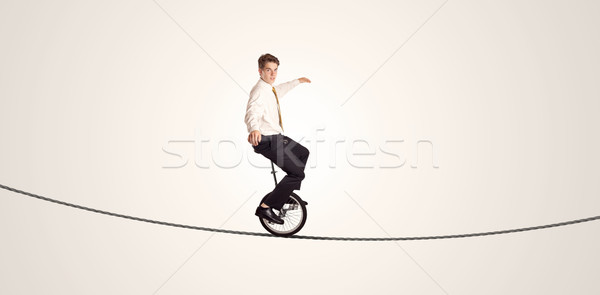 極端な ビジネスマン ライディング 一輪車 ロープ 男 ストックフォト © ra2studio