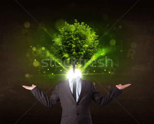 Man with green tree head concept Stock photo © ra2studio