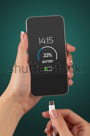 Holding telephone device from profile Stock photo © ra2studio