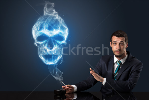 Businessman smoking concept Stock photo © ra2studio