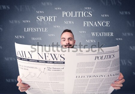 Businessman reading newspaper Stock photo © ra2studio