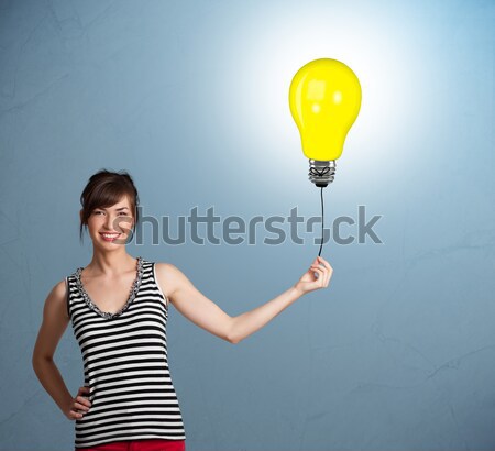 Joli dame ampoule ballon jeune femme [[stock_photo]] © ra2studio