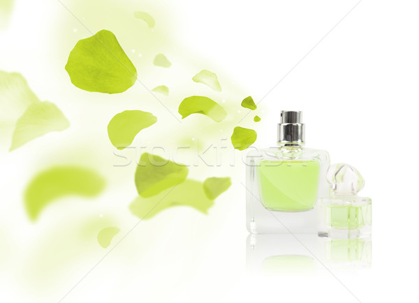 erfume bottle spraying rose petals Stock photo © ra2studio