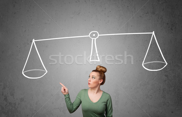 Young woman taking a decision Stock photo © ra2studio
