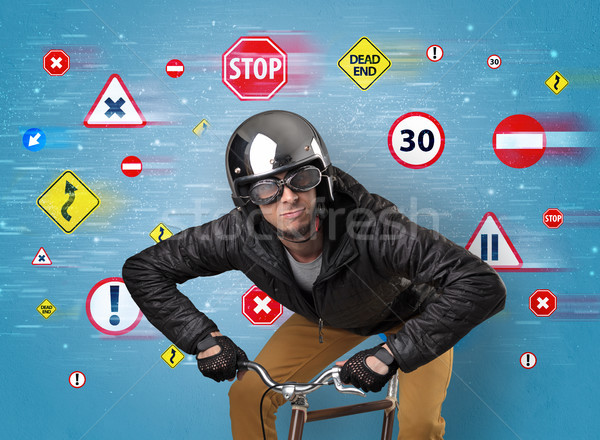 Stylish biker with highway code concept Stock photo © ra2studio