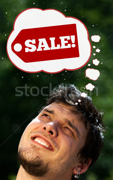 Young head looking at shipping and order signs Stock photo © ra2studio