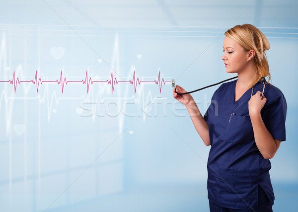 Bastante médico escuta vermelho pulso coração Foto stock © ra2studio