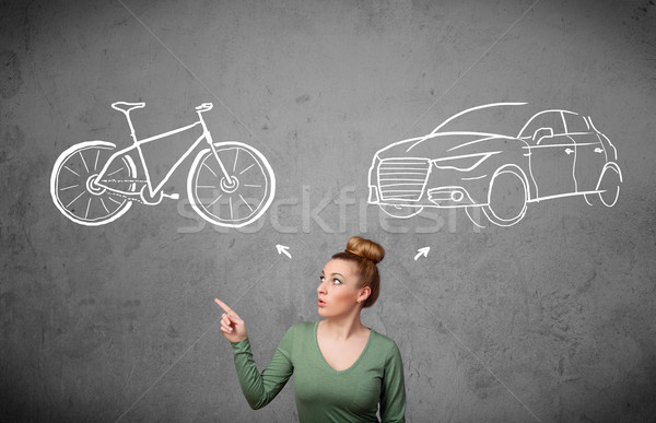 Woman making a choice between bicycle and car Stock photo © ra2studio