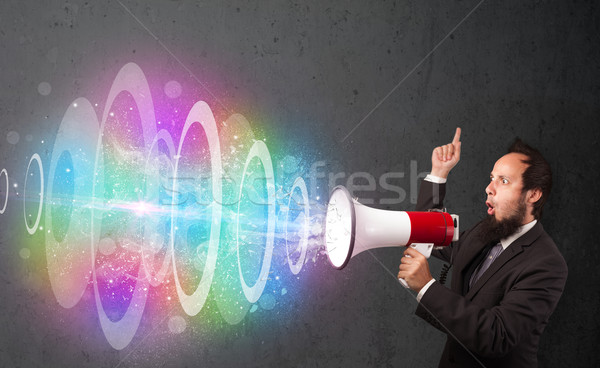 [[stock_photo]]: Homme · haut-parleur · coloré · énergie · poutre · sur