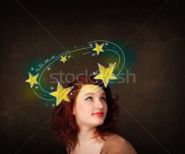 girl with yellow stars circleing around her head illustration Stock photo © ra2studio