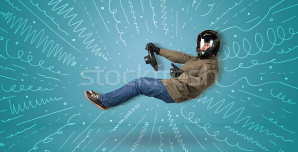 Funny guy drives an imaginary vehicle with drawn lines around hi Stock photo © ra2studio
