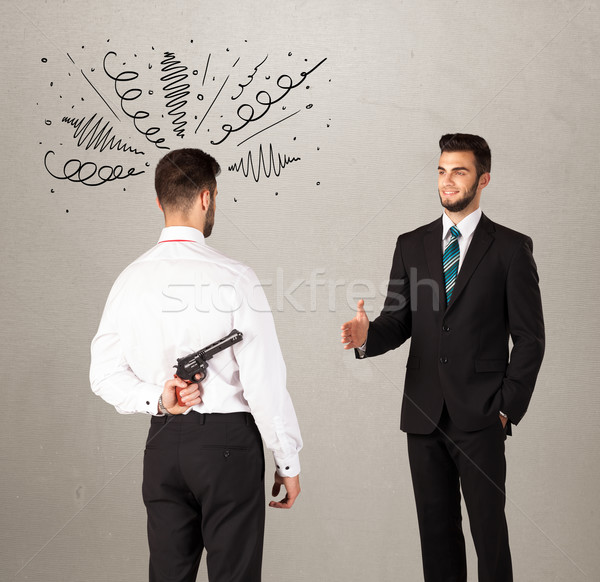 Angry business handshake concept Stock photo © ra2studio