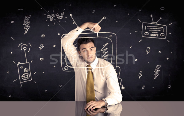 Happy businessman drawing tv and radio Stock photo © ra2studio