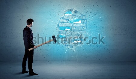 Homme d'affaires mur de briques énorme marteau homme [[stock_photo]] © ra2studio