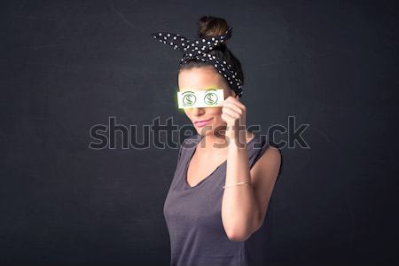 Fiatal lány tart papír zöld dollárjel arc Stock fotó © ra2studio