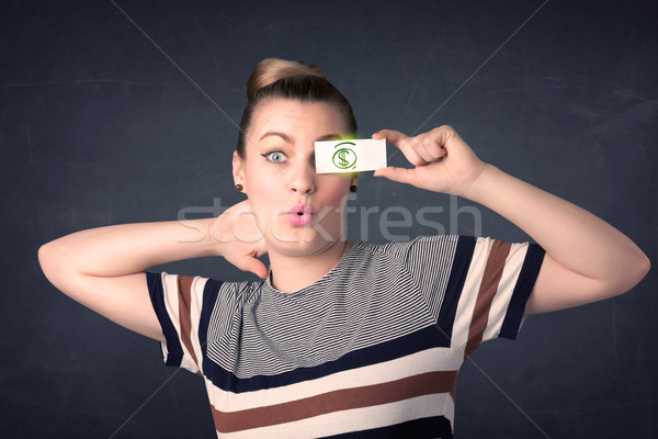 Fiatal lány tart papír zöld dollárjel üzlet Stock fotó © ra2studio