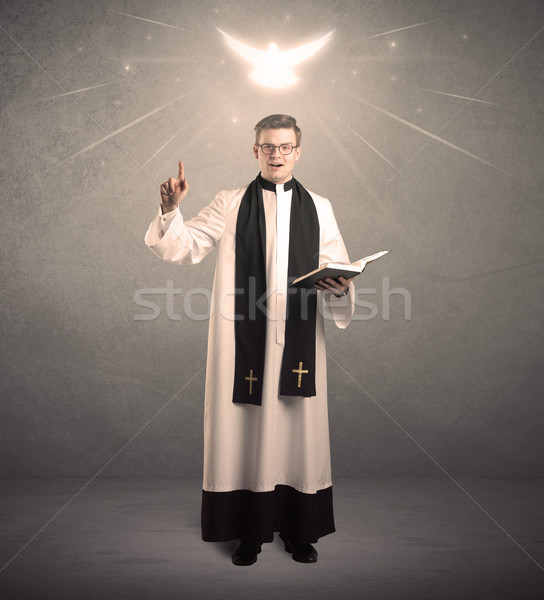 Fiatal pap áldás szent olvas ima Stock fotó © ra2studio