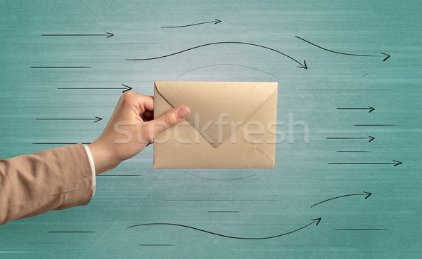 Hand halten Umschlag Pfeile herum weiblichen Stock foto © ra2studio