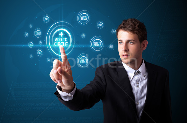 Stock photo: Businessman pressing modern social type of icons