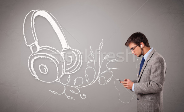 Foto stock: Atractivo · hombre · cantando · escuchar · música · resumen · auriculares